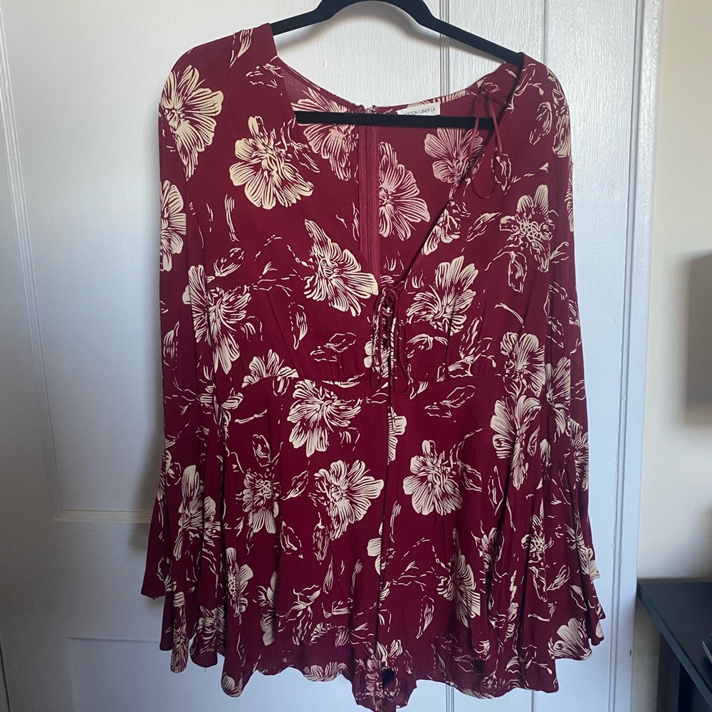 Red floral romper with bell sleeves